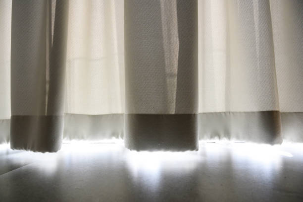 istock Through sheer window curtain over marble floor. Home interior design concept. 1450932283
