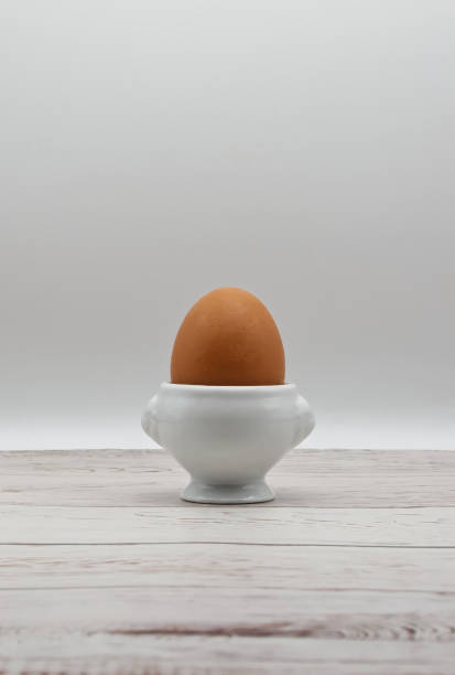 Easter spring still life with eggs and cherry twigsPhoto taken indoors with strobe light