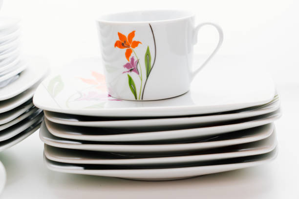 istock cups and plates with the image of flowers 1450934739