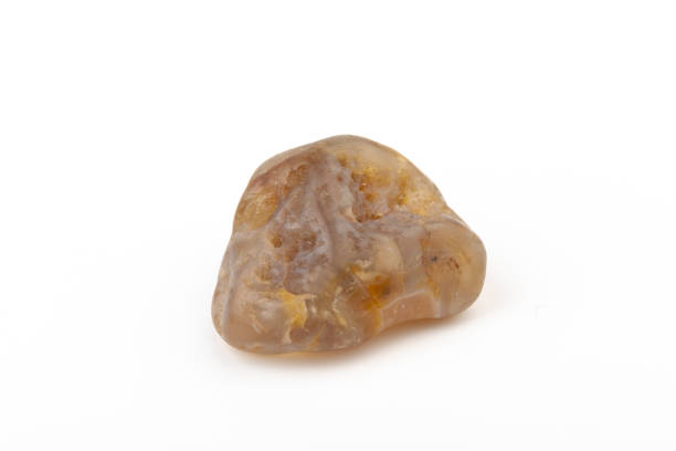 istock Multicolored gemstone, tumbled mineral. Bostwan agate of various sizes on a white background. 1450940141