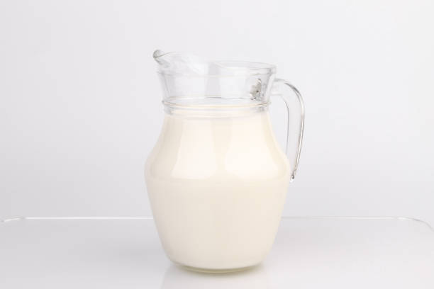 istock Jug of milk isolated on white background with clipping path. 1450940487