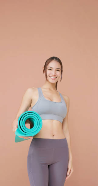 istock woman doing yoga 1450943828