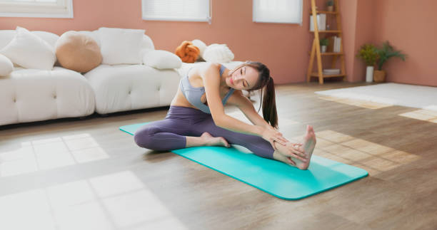 istock woman doing yoga 1450943901