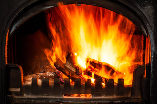 istock Heated a small private house with a wood stove. 1450958434