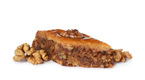 istock Delicious honey baklava with walnuts on white background 1450960753