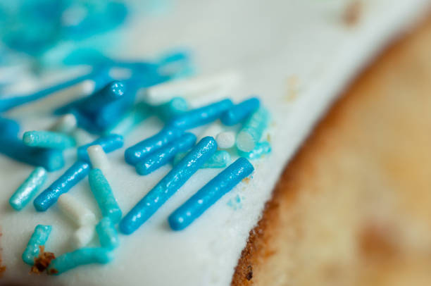istock Confectionery industry. Blue decorative pastry topping, macro shot. 1450962506