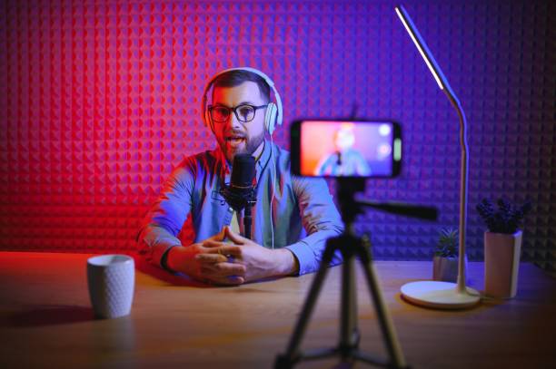 istock Young blogger with recording video 1450968645