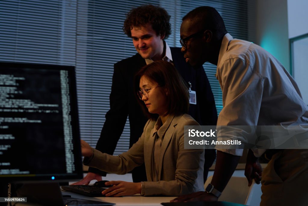 Programmmers Group Of Programmers Working With Security Codes Stock Photo - Download ...