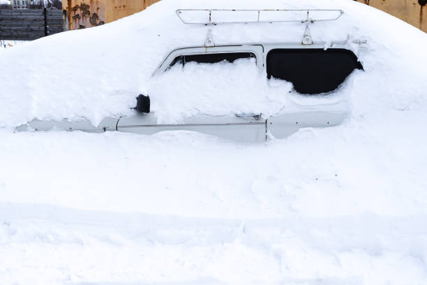 istock Record layer of snow on a car in winter 1450972772