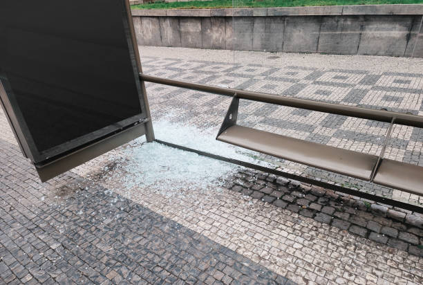istock Heap of broken glass at the bus stop 1450973405