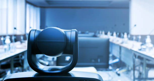 Behind camera video conferencing in meeting room