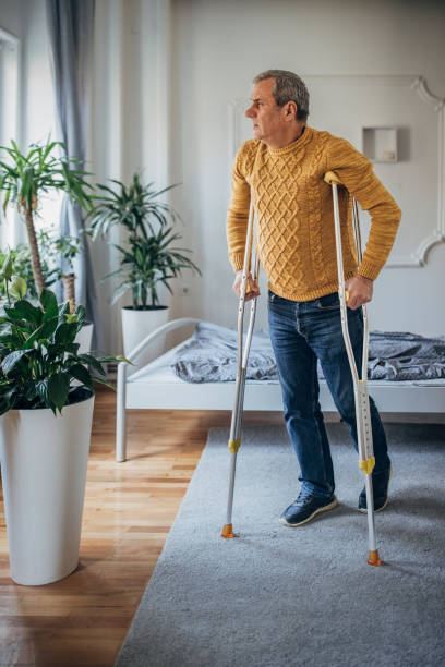 istock the man uses crutches, a walking aid 1450986069