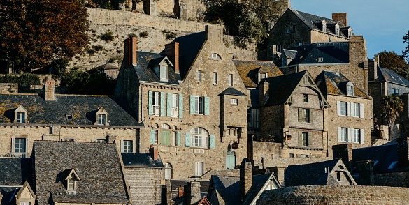 Saint-Brieuc, France, June 29, 2022 - People in front of historic half-timbered houses in Saint-Brieuc