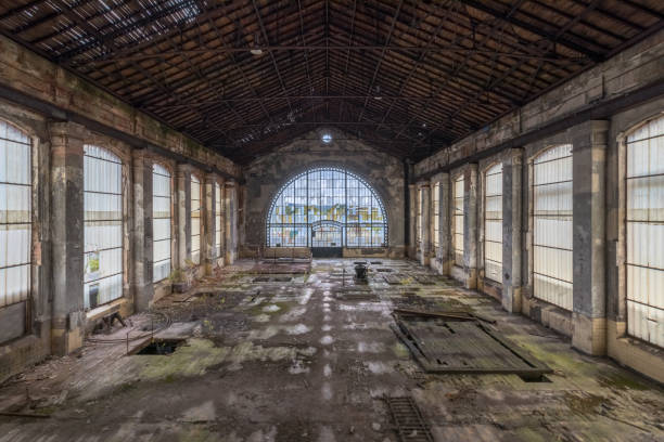 Old abandoned coal mine with a beautiful window, flooded with light