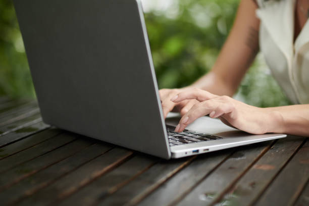 istock Businesswoman Typing on Laptop 1450997789