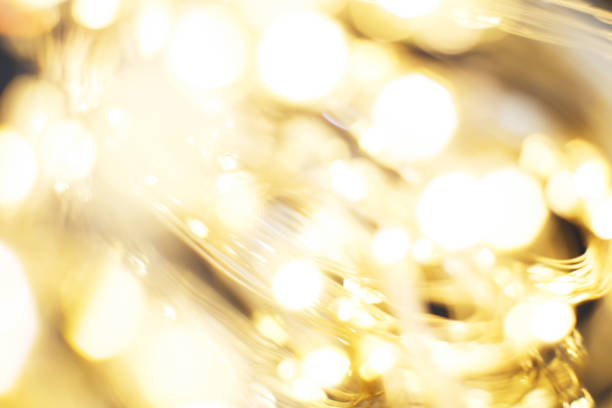 istock christmas beautifull shiny gold background. sparkle festive blurred bokeh 1450999039