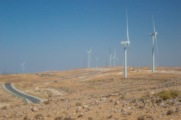 istock wind generator in desert sands of Jordan 1451001180
