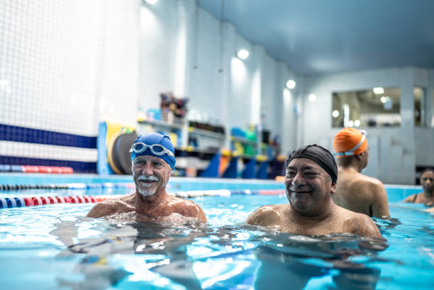 istock Senior men at swimming pool 1451002199