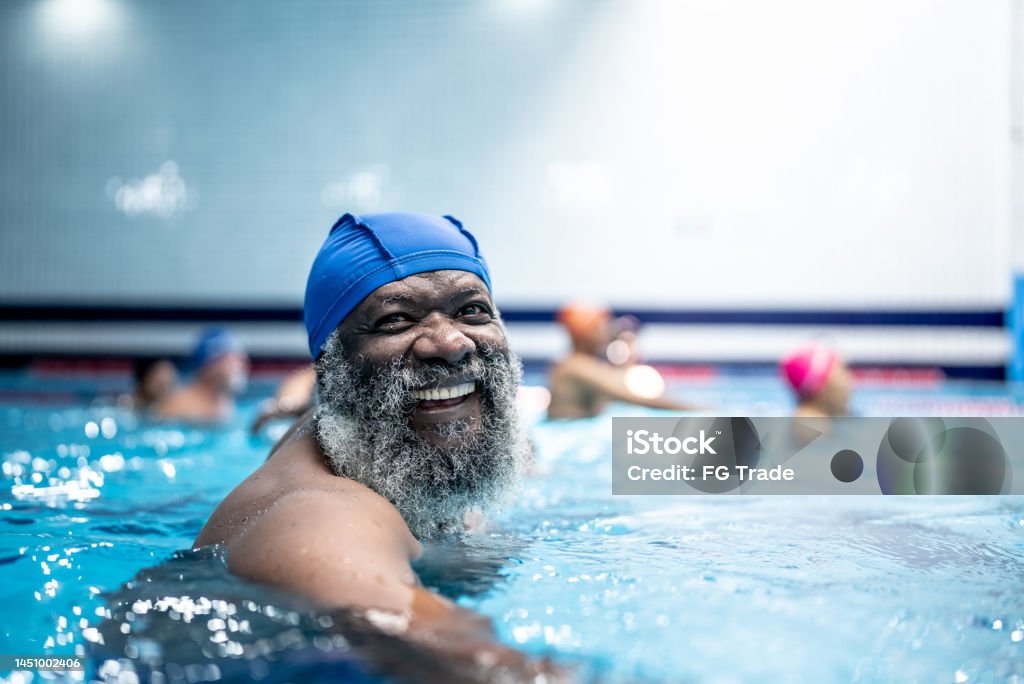 Portrait of a senior man at swimming pool Healthy Lifestyle Stock Photo