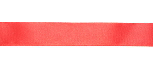 istock Beautiful red ribbon isolated on white, top view 1451005094
