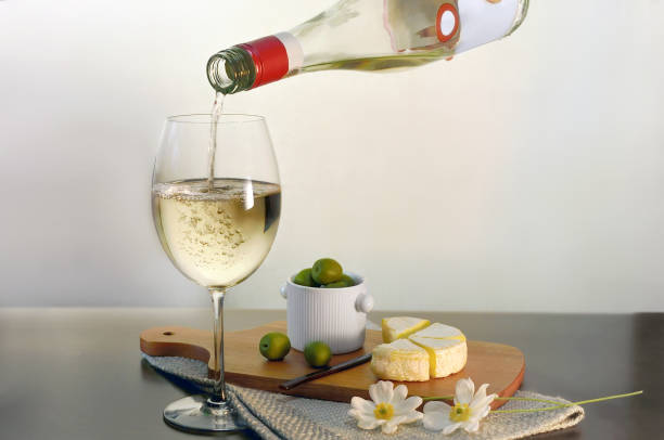 istock Pouring A Bottle of Wine 1451006089