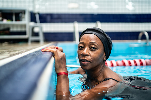 Portrait of a senior woman in the swimming pool
