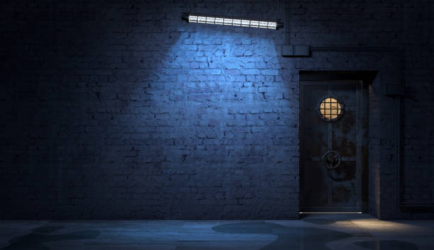 istock Brick wall of a street facade at night 1451010583
