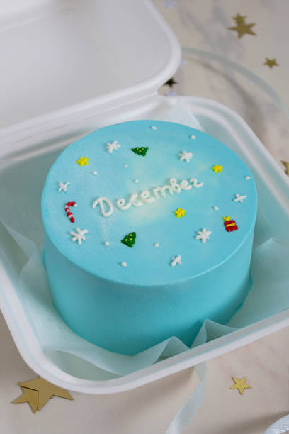 istock small blue bento cake with christmas decor and text december 1451014441