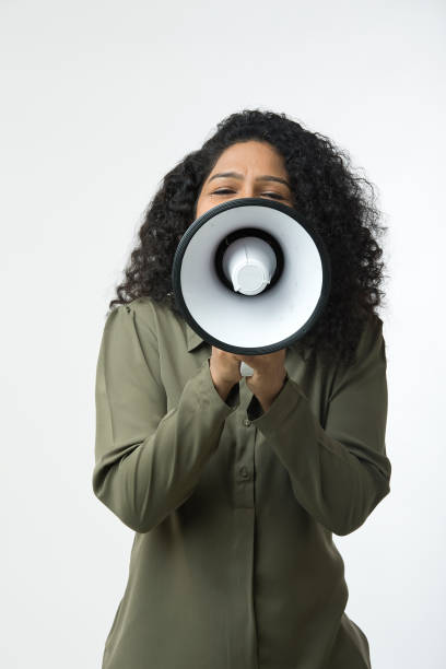 istock Woman screaming into megaphone 1451022815