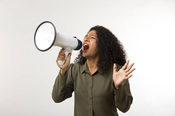 istock Woman screaming into megaphone 1451023482