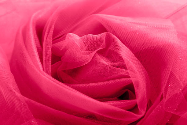 istock red fabric background from organza, tulle, silk 1451023512