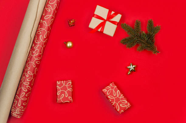 istock Christmas decorations concept. Top view gift boxes wrapping in craft paper 1451031734
