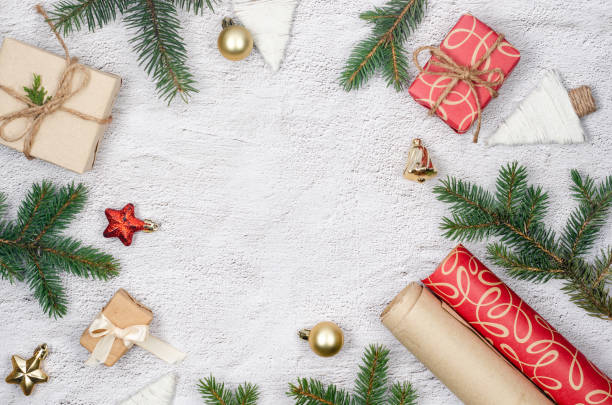 istock Christmas Holiday background frame with gift boxes, pine branches and decoration 1451031857