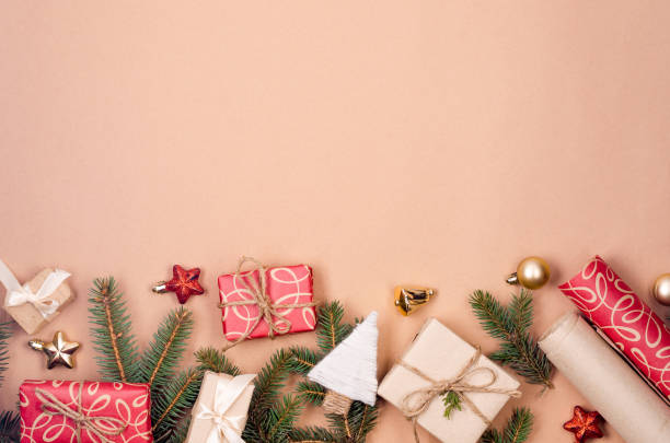 istock Christmas Holiday background frame with gift boxes, pine branches and decoration 1451031869