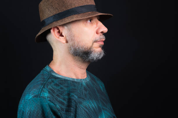 istock Man wearing hat. Looking to the right side. 1451032339
