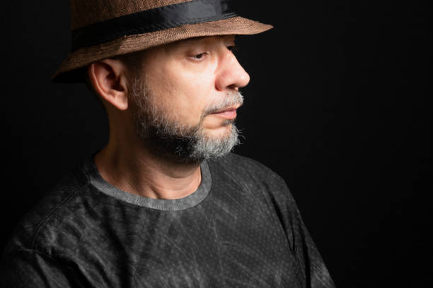 istock Man wearing hat. Looking to the right side. 1451032373