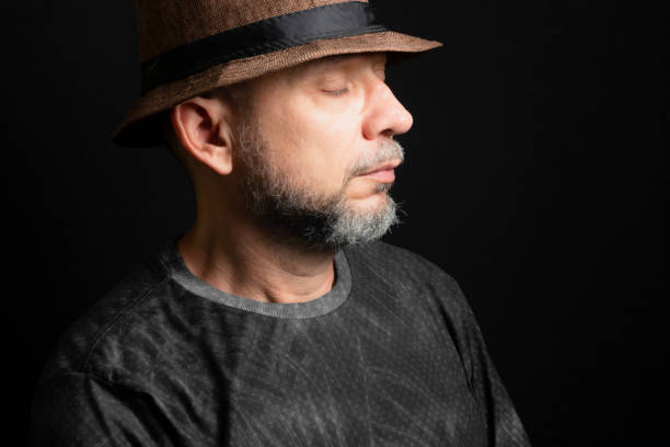 istock Man wearing hat. Looking to the right side. 1451032374