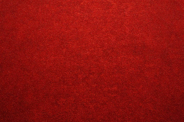 istock new year red color glitter paper abstract, grunge texture background 1451034158