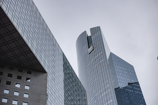 Low Angle Shot Of Office Buildings In Financial District La Defense In Paris