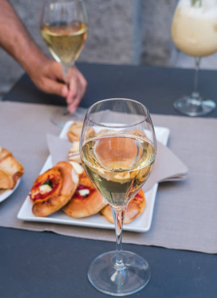 istock White Wine Glass and Pizza Appetizer 1451037197