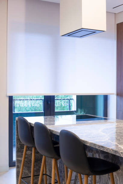 istock Roller blind large size on the window in the interior. 1451040223