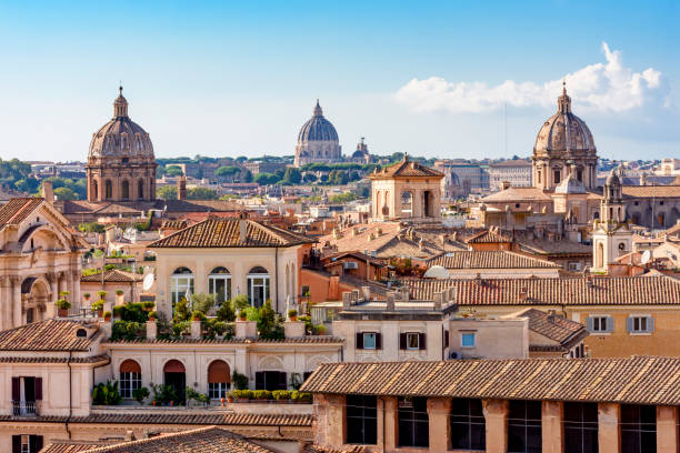 rome cityscape with dome of st. peter's basilica in vatican - rome italië stockfoto's en -beelden
