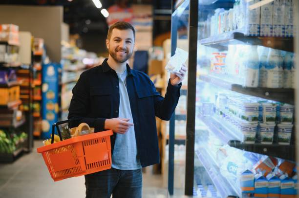 istock man in supermarket, grocery store customer 1451049184