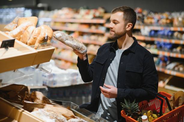 istock Man shopping in a supermarket 1451049797