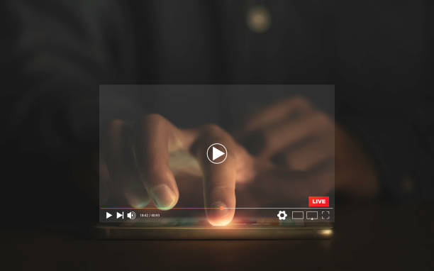 istock Man touching smartphone to watching and live streaming window for Video streaming on internet and multimedia technology concept. 1451049954