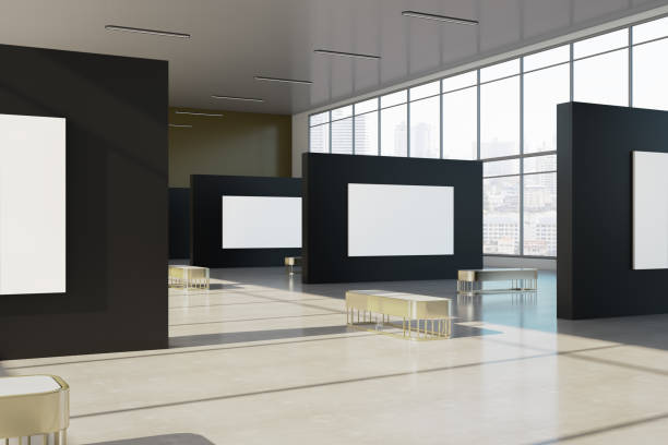 istock Contemporary gallery interior with empty white mock up banner on black wall installation, windows with city view and daylight. Museum and exhibition concept. 3D Rendering. 1451050251