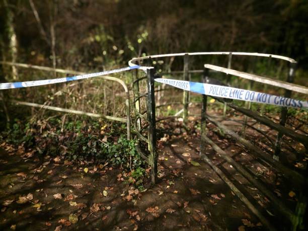 istock Murder scene with signs on the fence 1451058989