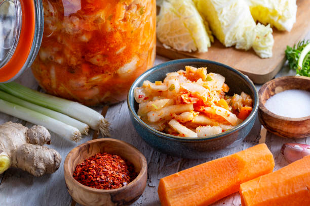 istock Homemade kimchee and glass jar 1451063904