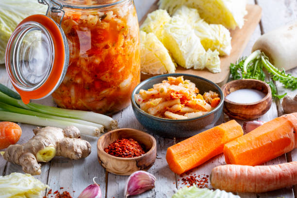 istock Homemade kimchee and glass jar 1451064041