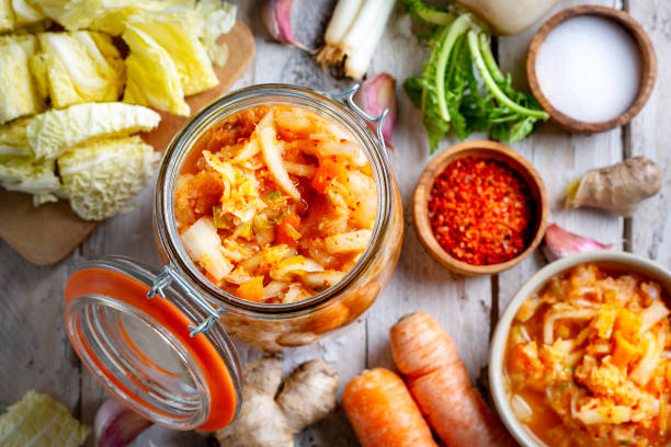istock Homemade kimchee and glass jar 1451064054